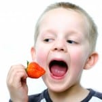 http://www.publicdomainpictures.net/view-image.php?image=39745&picture=happy-little-boy-eats-strawberries&large=1